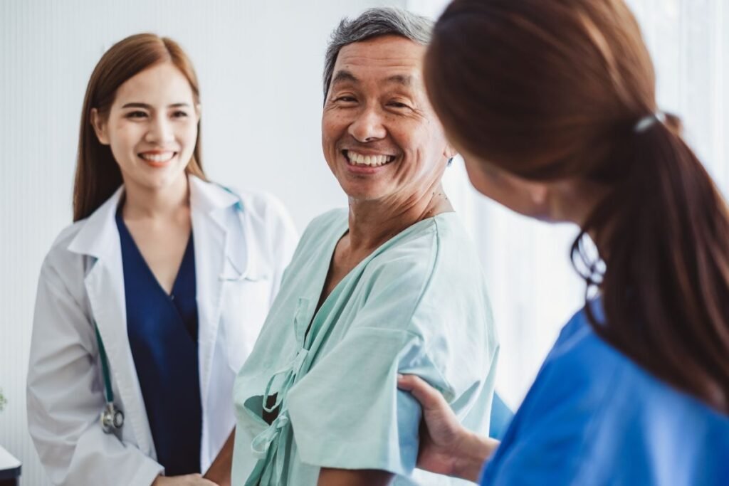 doctor speaking to an elderly patient about their individual health insurance coverage needs